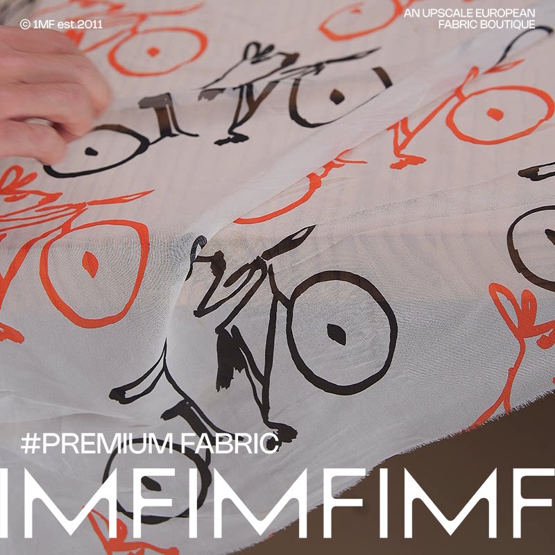 真丝弹力乔其小狗单车卡通银狐服装面料布艺 幅宽135CM