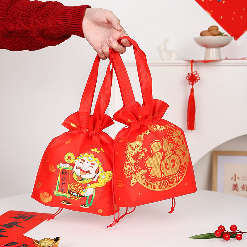 新年春节抽绳束口袋子福袋喜庆礼品包装手提无纺布烫金烫画礼盒