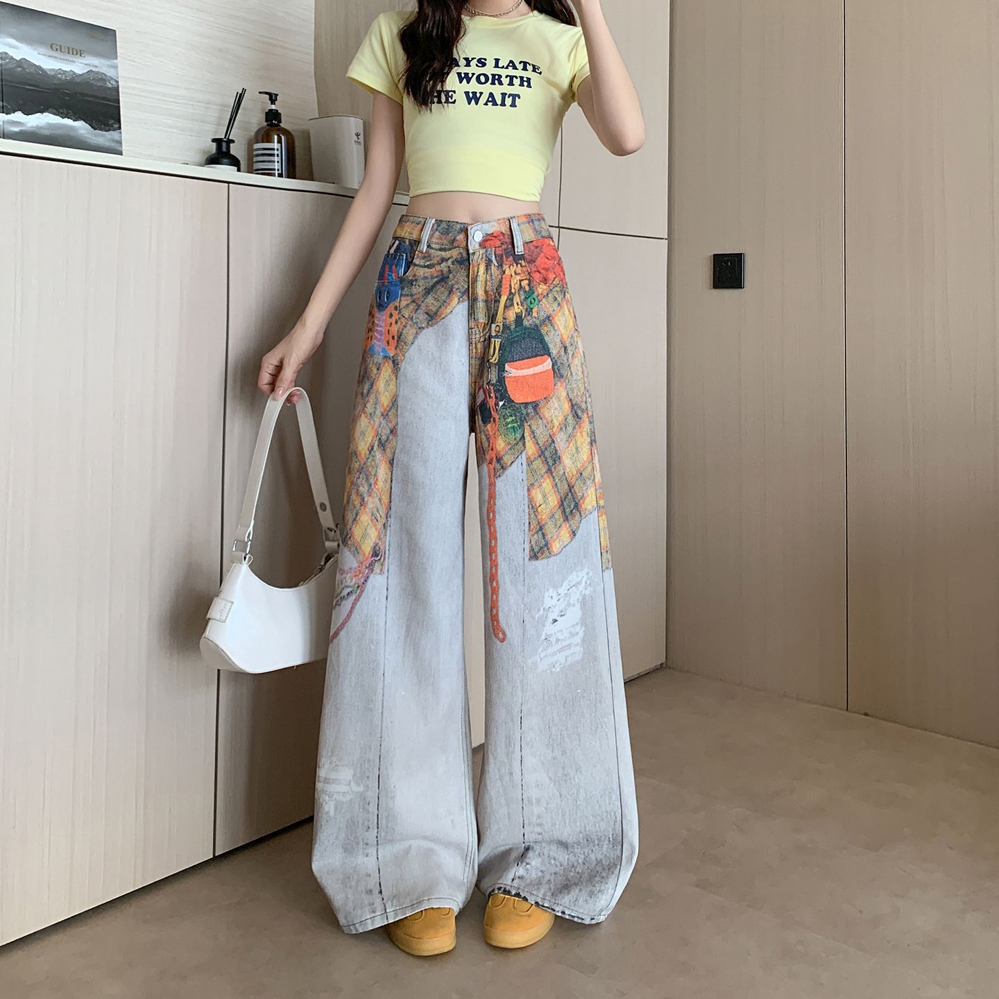 美式复古屁帘印花牛仔裤裤子女款2026秋季新款宽松阔腿裤弯刀裤潮