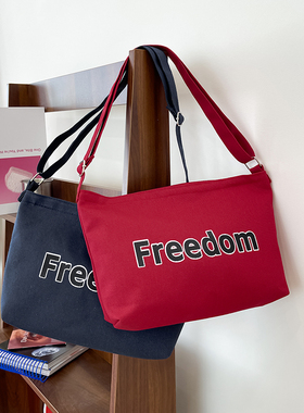 2025秋冬韩系简约字母帆布包大容量斜跨包休闲百搭单肩包男女同款