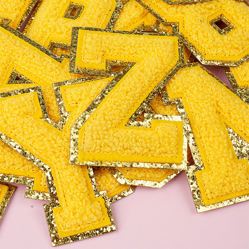 黄色毛巾绣英文字母补丁服装辅料毛巾绣绣花标徽章贴背胶熨烫