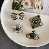 时尚 英伦风男女复古徽章胸针星球女欧美风满钻珍珠拼色胸针领针