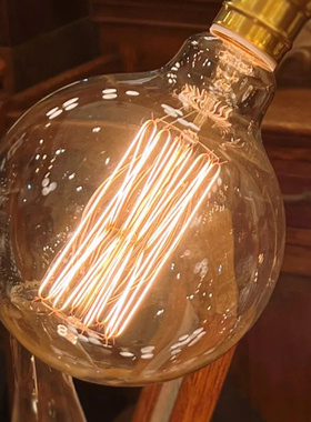 复古爱迪生钨丝灯泡E27大螺口40W暖黄色家用怀旧光源T300装饰球泡