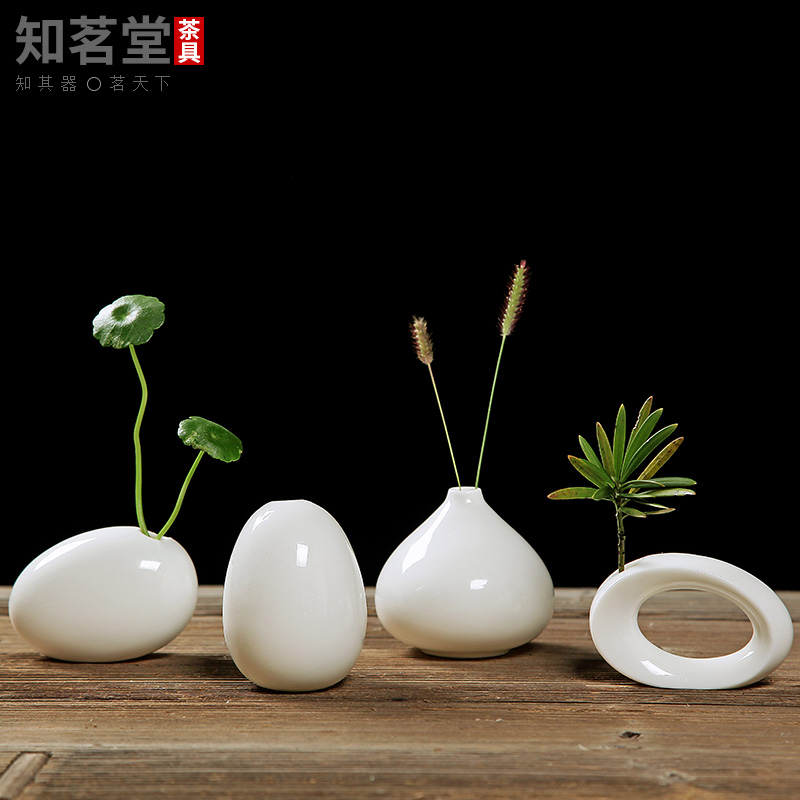 New Dehua white porcelain Mini vase personality pure white ceramic simple small fresh flower device creative flower arrangement