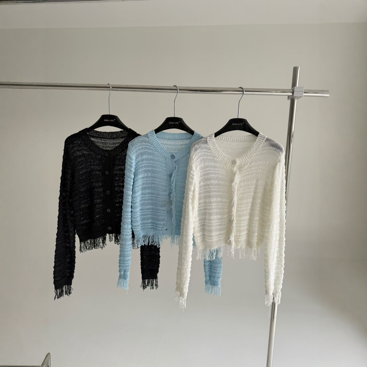 2026春季新款韩版圆领单排扣高级感流苏镂空百搭针织开衫上衣外套