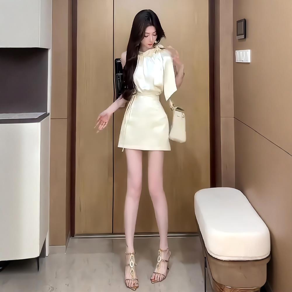 气质女神范高端套装2025夏季无袖挂脖上衣+高腰a字半身裙两件套女