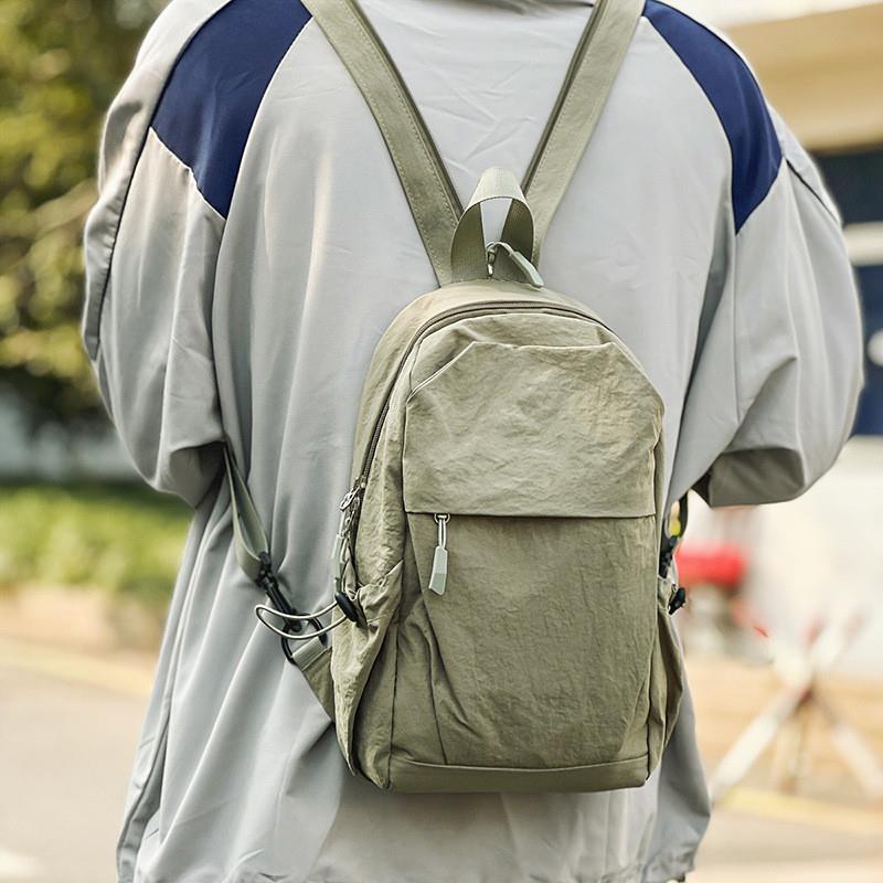 新款多功能防泼水双肩胸包男女轻便出游小背包男士户外登山斜挎包