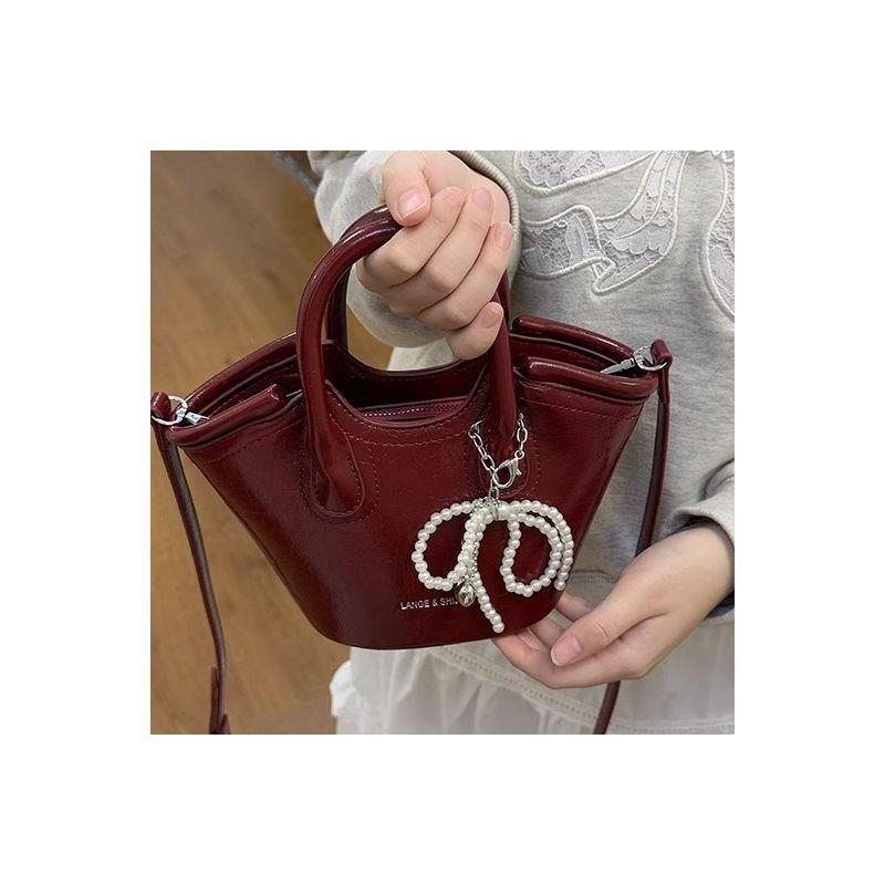 高级感轻奢菜篮子包女2025新款小众设计手提水桶洋气单肩包