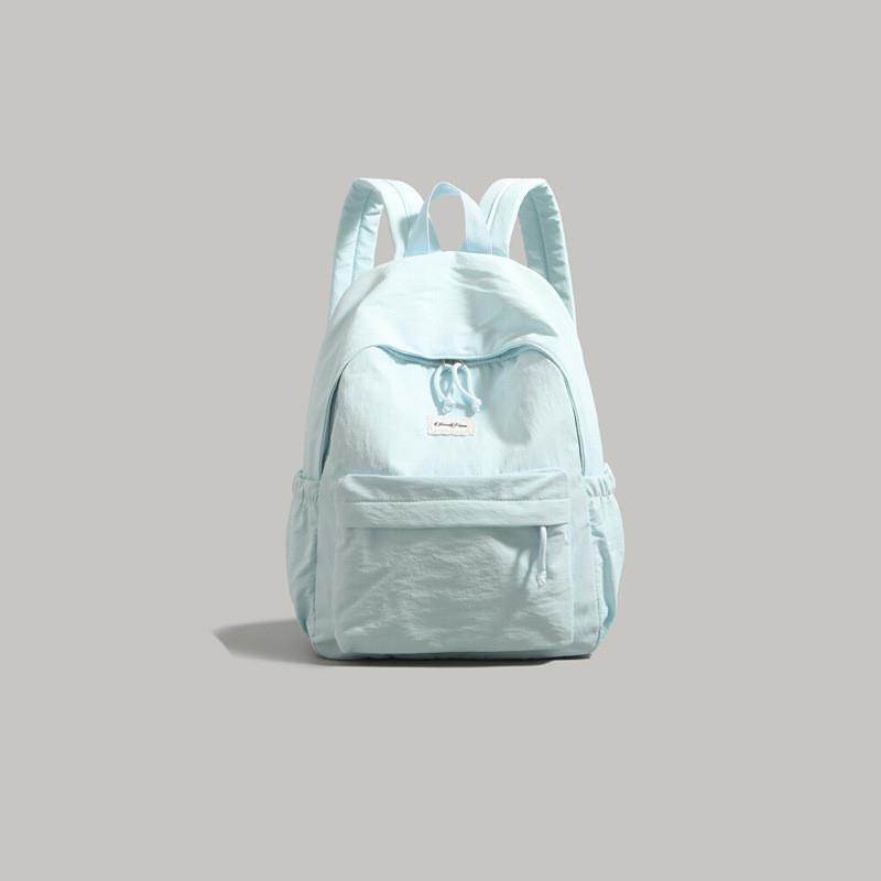 高颜值纯色双肩包女2025新款大学生书包大容量轻便短途旅行背包