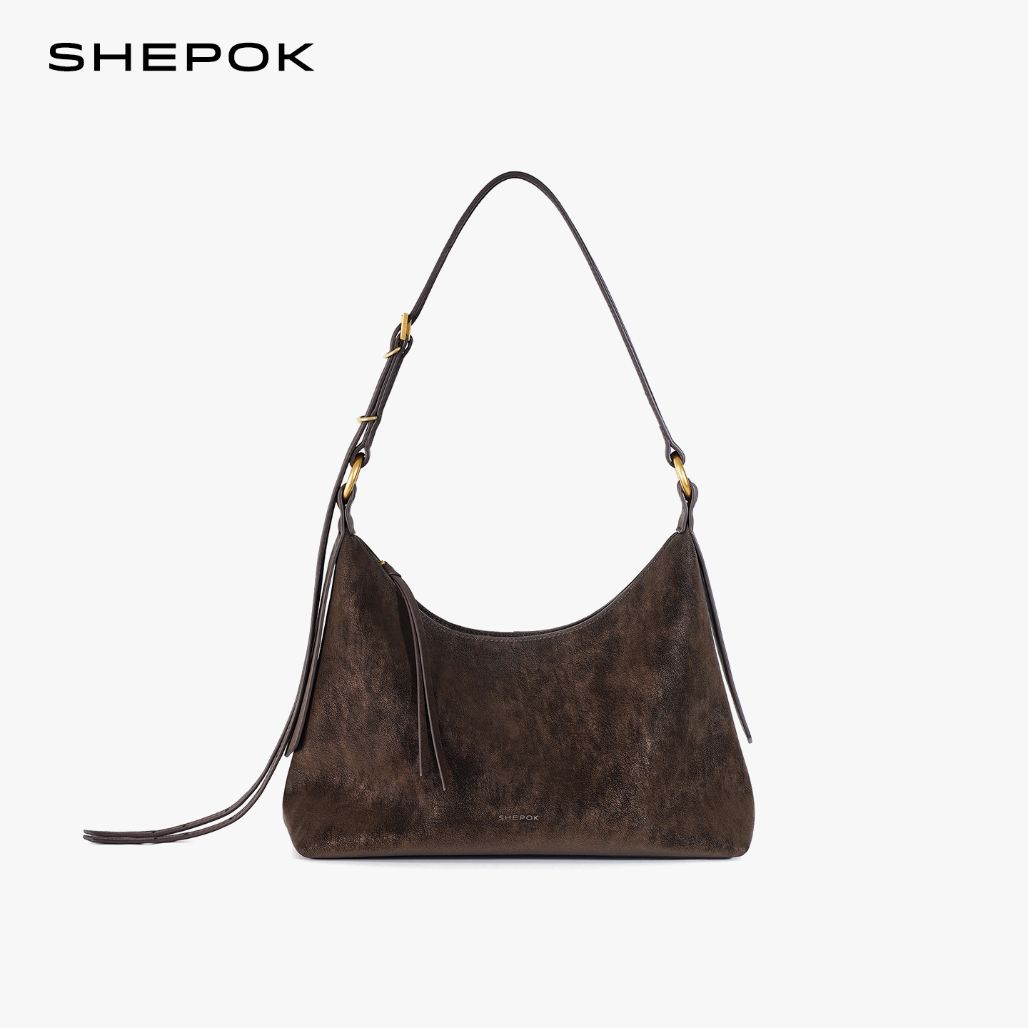 西泊克2025新款牛皮托特包女小众设计感单肩腋下包通勤斜挎饺子包