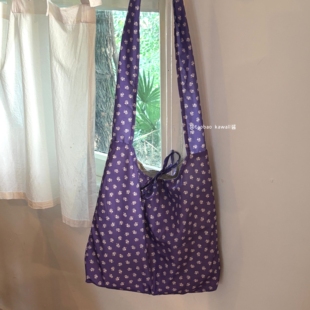 春日小清新紫色碎花单肩包女韩系蝴蝶结海边沙滩大容量手提帆布包