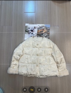 袖口拼接水貂毛羽绒服2025新款冬中长款好看洋气独特别致提花外套