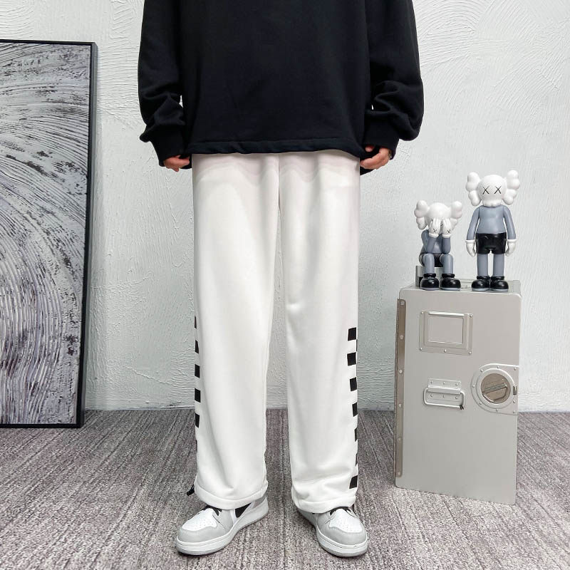 秋季长裤男士休闲裤坠感宽松阔腿裤黑白格子运动裤抽绳束脚裤卫裤图片