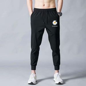 2021秋季休闲运动裤男日系大码冰丝印花哈伦九分裤子男K101-P15图片