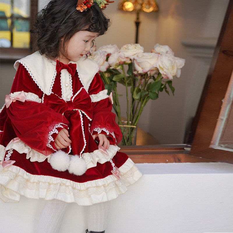 冬のかわいい女の子のワンピースはダウンの王女のスカートをプラスしてロリータのダウンの女の子の赤ちゃんの1歳のドレスのウサギの耳