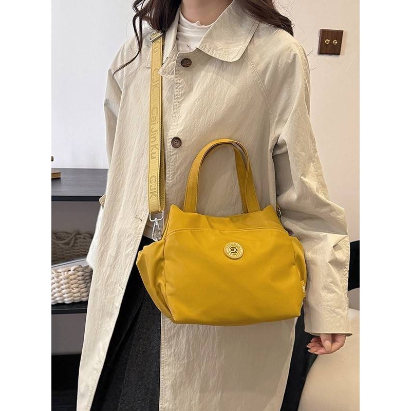 官方品牌休闲百搭耐磨手提水桶包包女2025冬季新款洋气质感轻便手,箱包皮具/热销女包/男包,通用款女包,淘宝优惠券,粉丝福利购,淘宝优惠卷