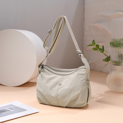 牛津布饺子包女斜挎包简约轻便多层包包女士单肩斜挎包通勤帆布包