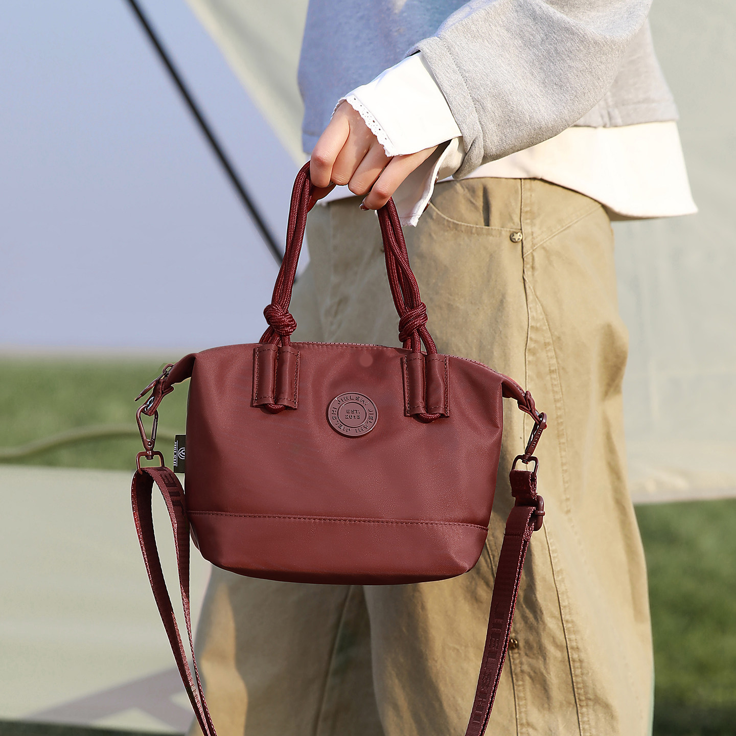 简约轻便通勤托特包包女2025新款手提单肩挎包百搭防水斜挎饺子包,箱包皮具/热销女包/男包,通用款女包,淘宝优惠券,粉丝福利购,淘宝优惠卷