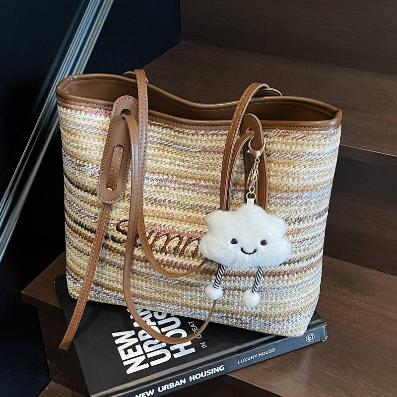 质感超火彩虹编织包包女式2025新款通勤百搭单肩大容量草编托特包