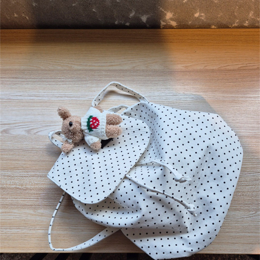 2025新款韩黑白波点ins风简约抽绳背包波点大容量通勤百搭双肩包