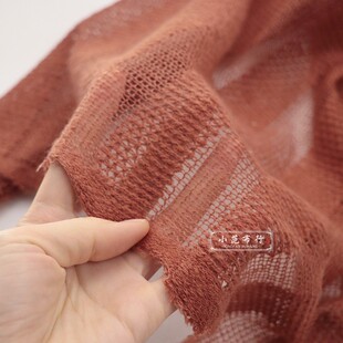 桔红色春秋镂空编织毛线布料 柔软设计感连衣裙罩衫围巾服装面料