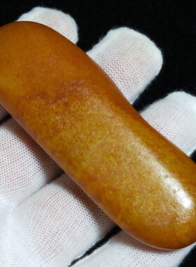 已售67.6克和田玉黄沁籽料原石把件长条状一口气毛孔清晰无伤无裂