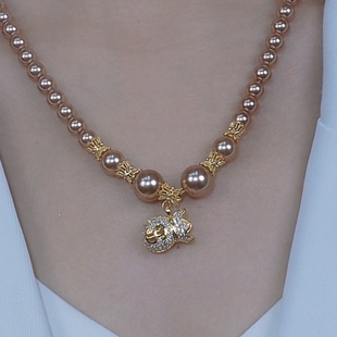 高级感2025新款时尚香槟色珠珠王妃链项链女短款设计感毛衣链配饰