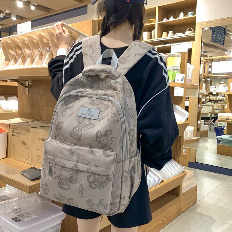 书包女韩版大容量轻便减负背包大学生简约高中初中学生结实双肩包