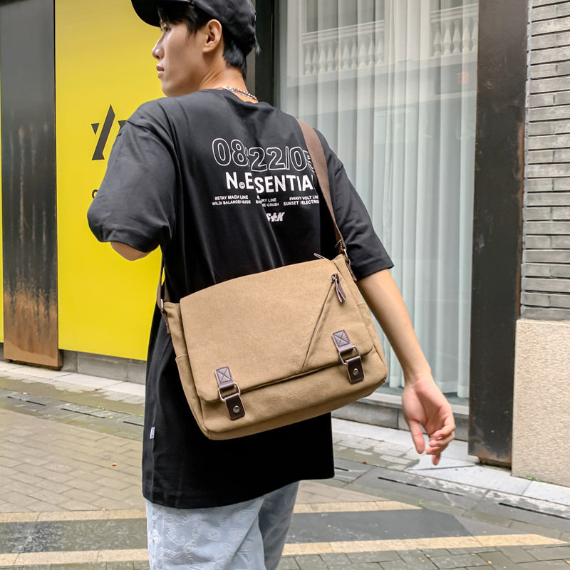 学院风帆布男包潮流男士工装包休闲单肩包大容量邮差斜挎包包横款