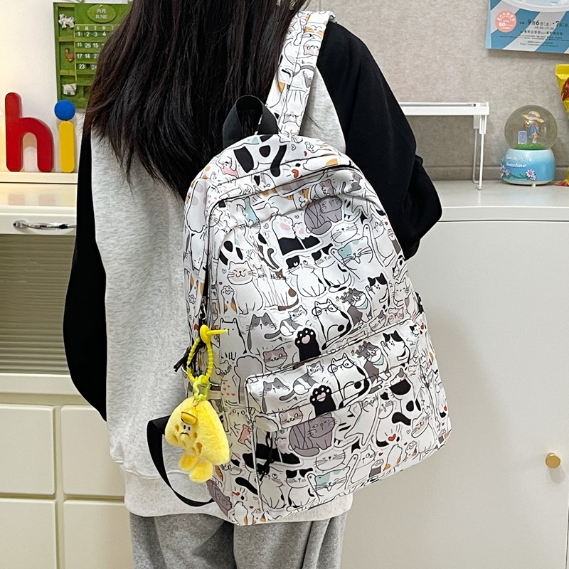 新款涂鸦双肩包女生初中生小学生潮牌背包男生时尚轻便书包潮