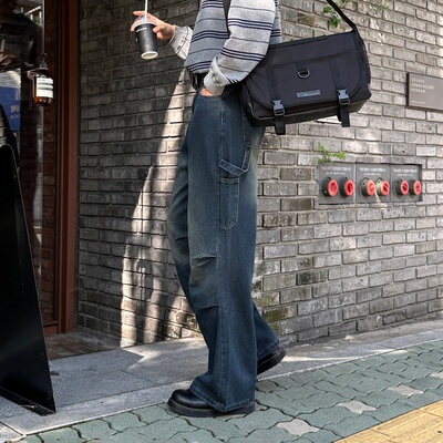 韩国男装做旧水洗膝盖捏褶牛仔裤