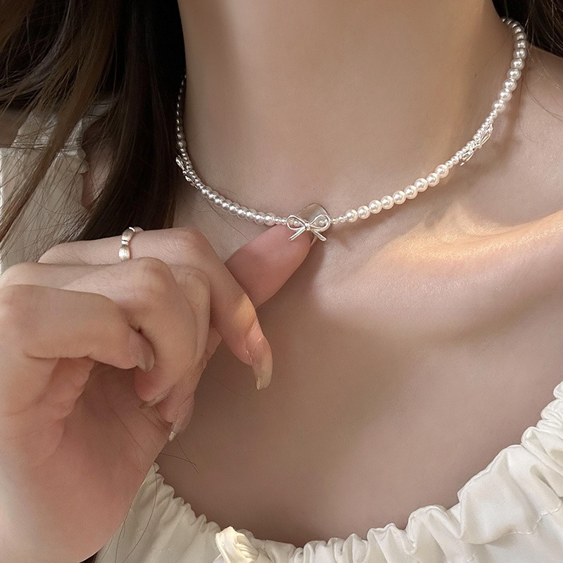 银色蝴蝶结珍珠项链配饰女款轻奢高级感choker甜酷拼接锁骨链颈链