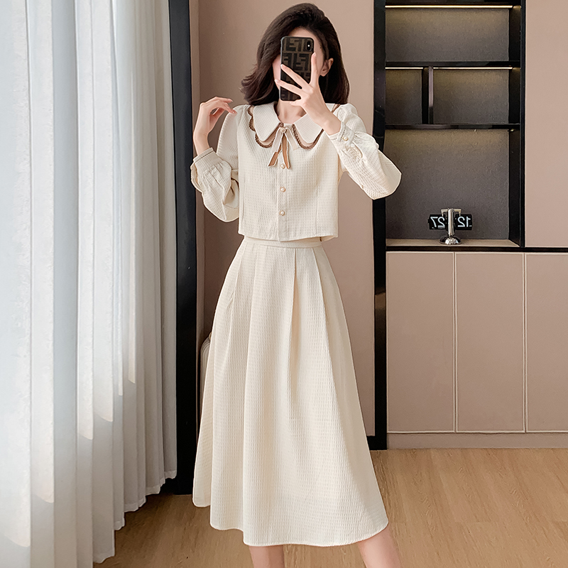 时尚通勤气质半裙套装女2025春季新款娃娃领设计感小众显瘦两件套,女装连衣裙,衣嘉衣服饰 时尚通勤气质半裙套装女2025春季新款娃娃领设计感小众显瘦两件套,女装连衣裙,衣嘉衣服饰