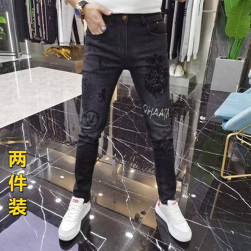 春秋季潮牌牛仔裤男重工烫钻印花时尚潮流修身百搭黑色小脚长裤子