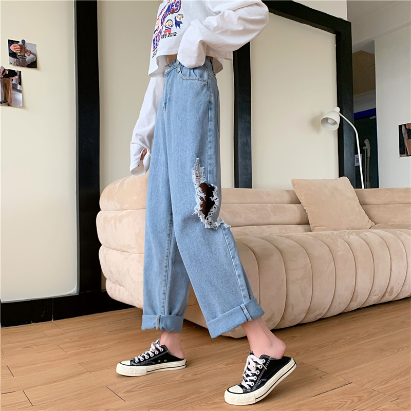 Real shot in spring and summer with holes in beggars' jeans