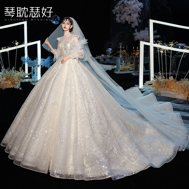 港风复古长袖小众香槟色婚纱租赁金色轻奢礼服出租新娘2026新冬款图片