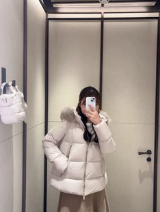 连帽毛领A字版羽绒服2026早秋新款深圳南油外套女款轻奢休闲时尚