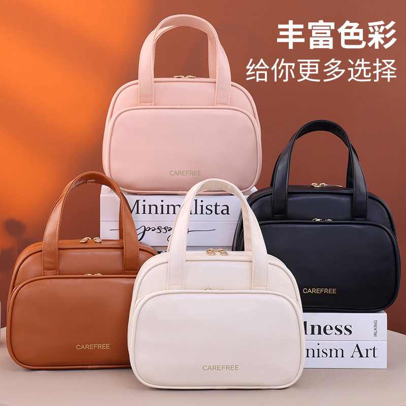 双层分区化妆包便携大容量高级防水旅行手提皮质化妆品收纳洗漱包