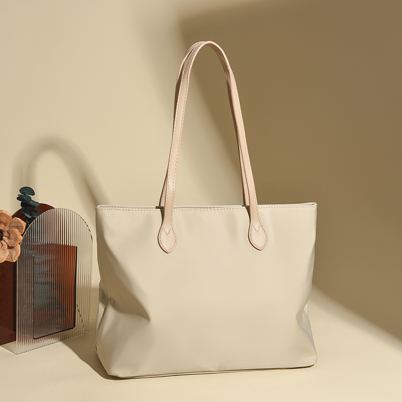 简约韩版牛津布大包包女2025新款轻便大容量通勤托特包女士单肩包