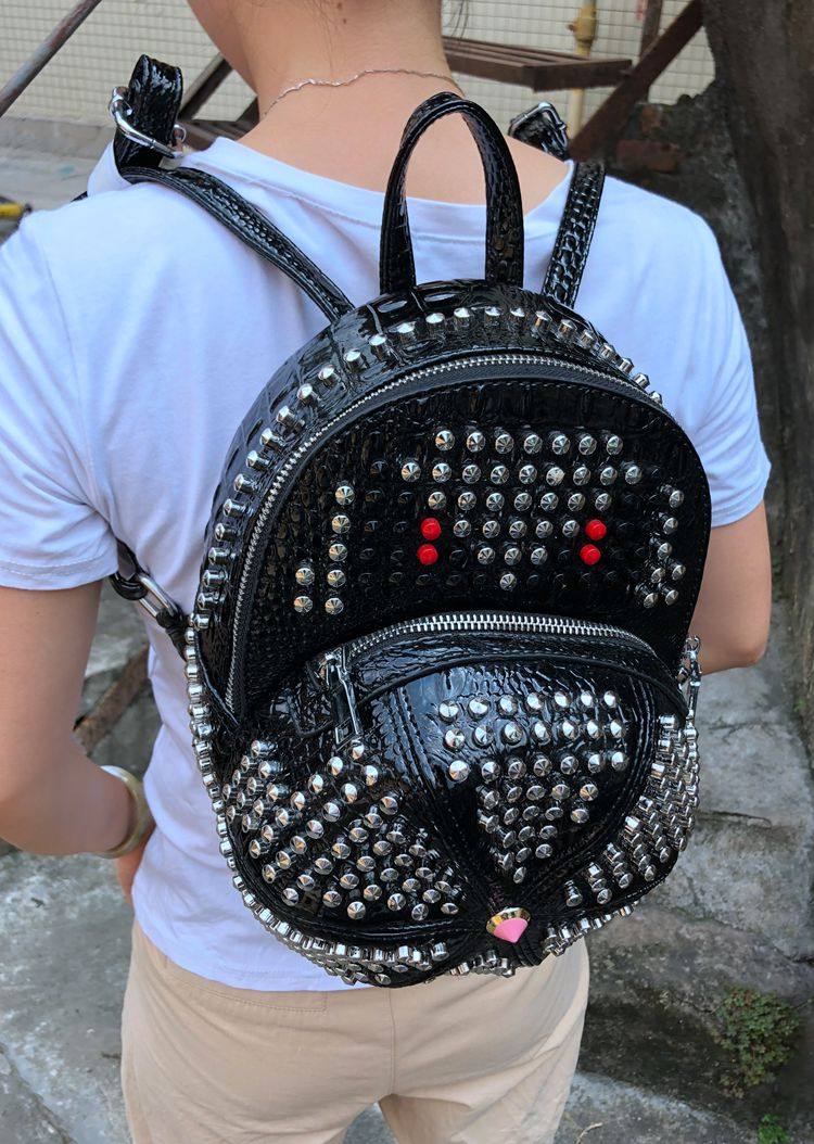 时尚休闲男女真皮双肩背包朋克风铆钉包包韩版潮流学院风帽子包包