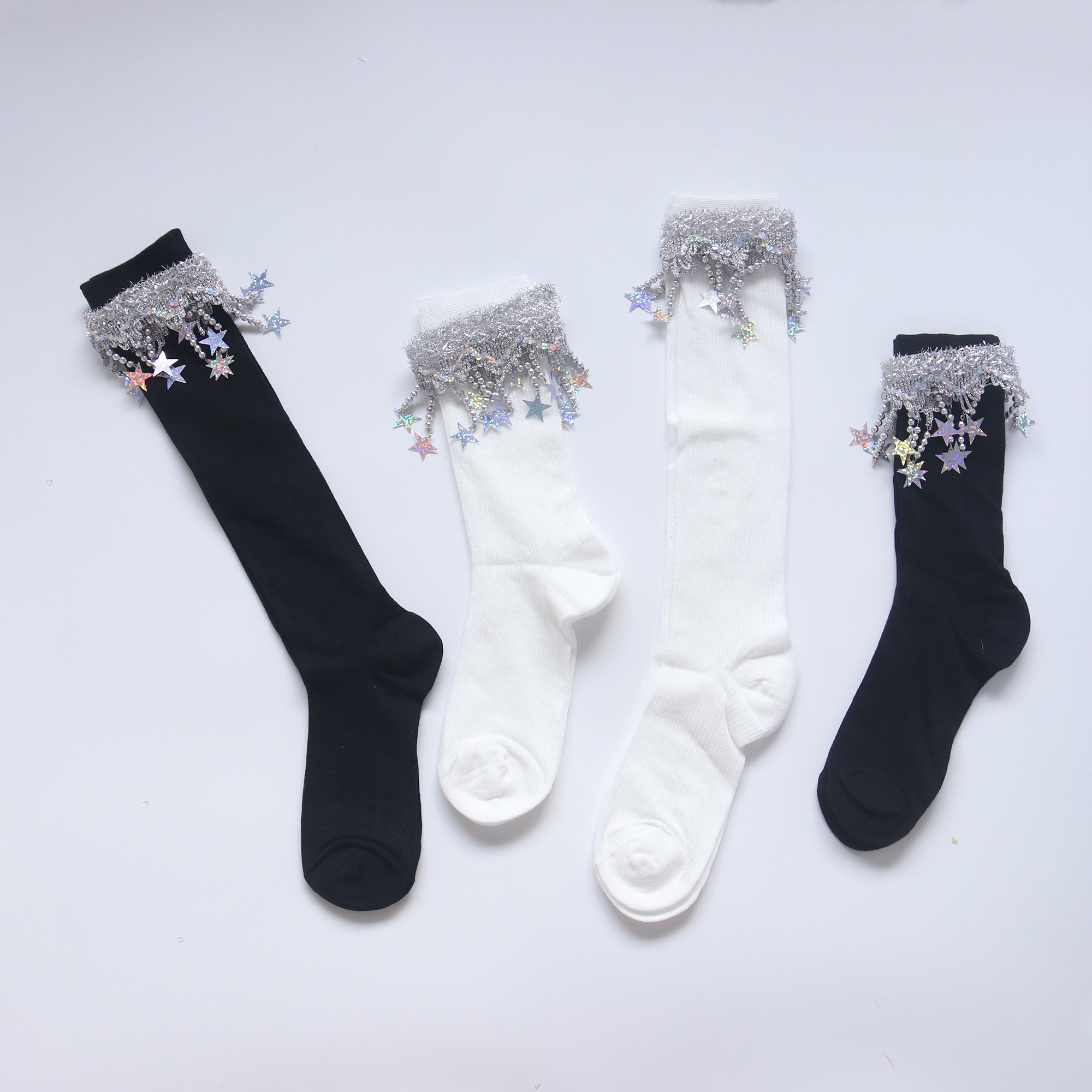 走秀表演袜子女款长2025年新款夏季小腿袜黑白色中流苏星星长筒袜