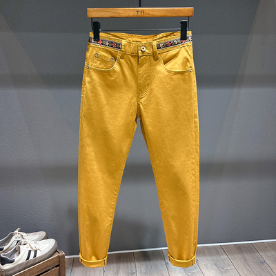 高端轻奢黄色九分牛仔裤男痞帅修身小脚裤休闲百搭织带装饰长裤子