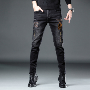 欧洲站黑色牛仔裤男2025新款修身小脚金牛刺绣弹力长裤子潮牌高端