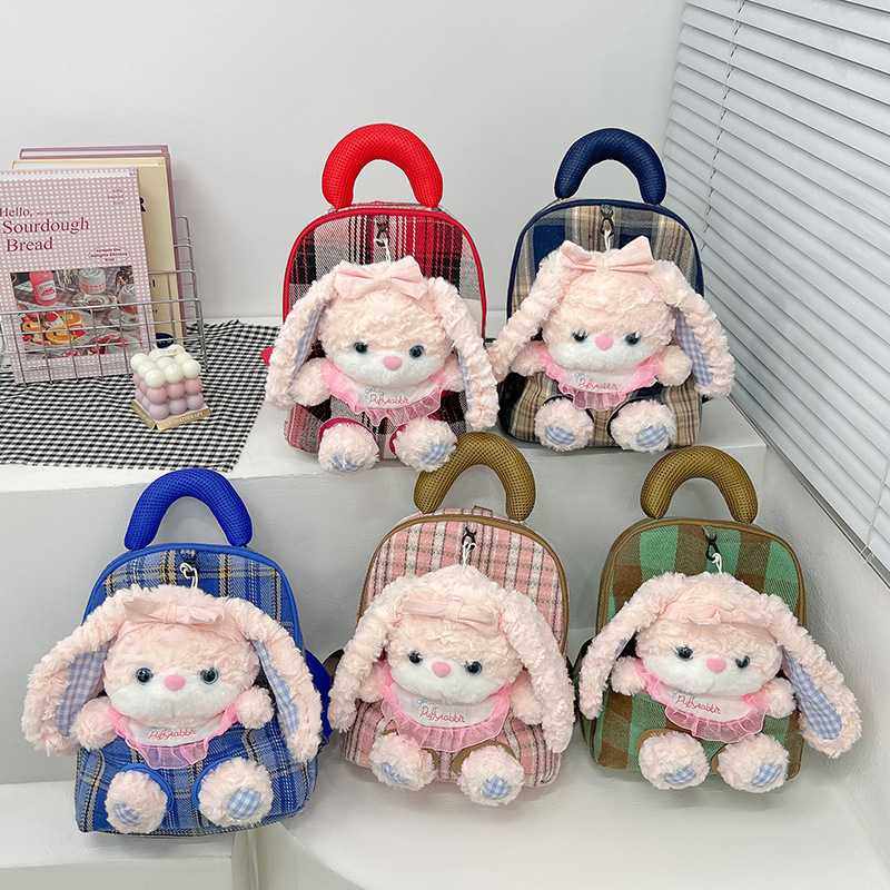 跨境新款儿童双肩包潮流卡通玩偶背包可拆卸两用幼儿园书包