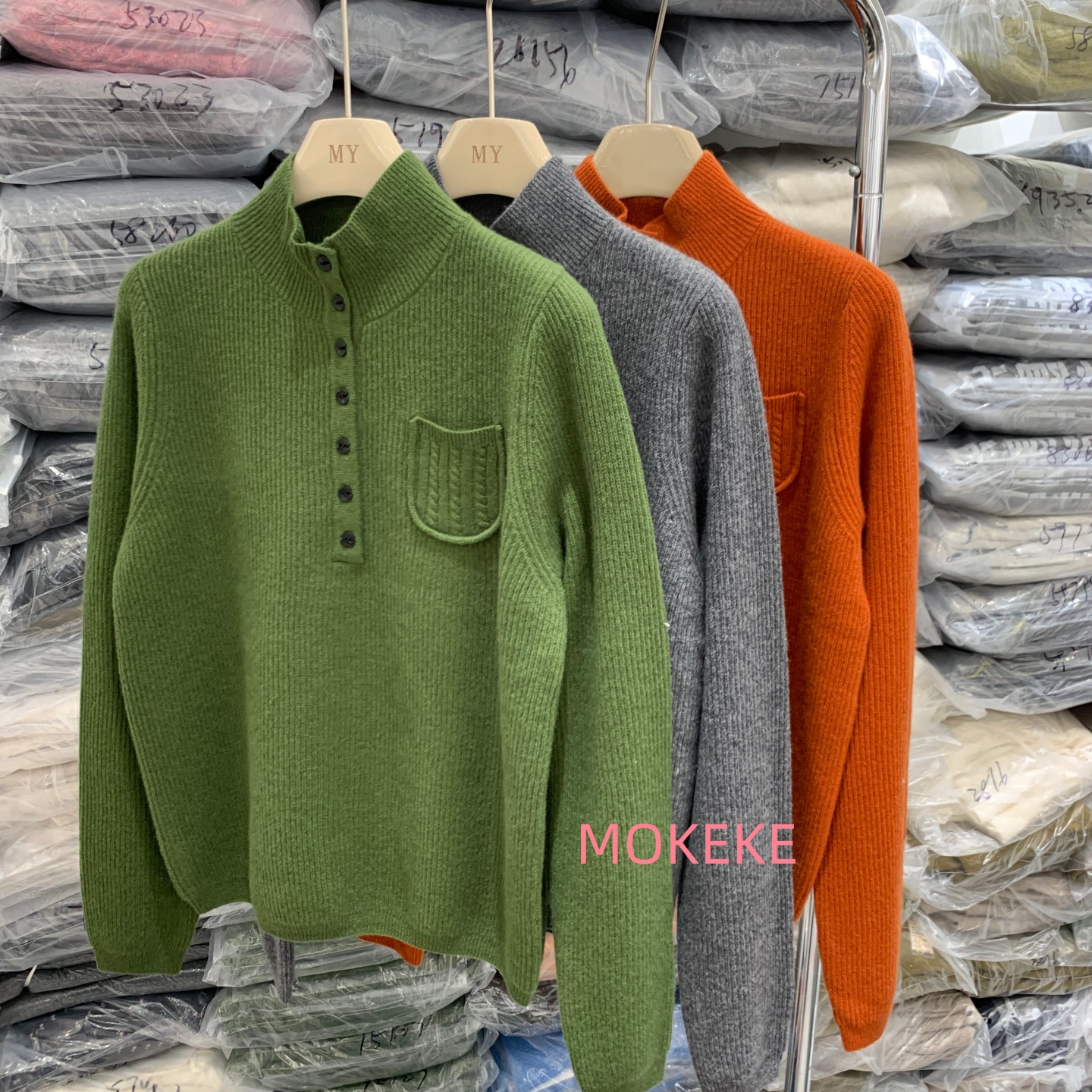 韩系新款立领半开扣口袋针织衫