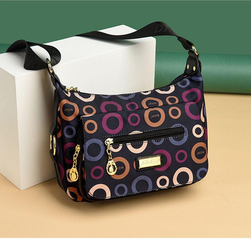 杰克丹妮妈妈简约帆布百搭牛津纺秋冬中老年挎大容量旅行斜挎女包