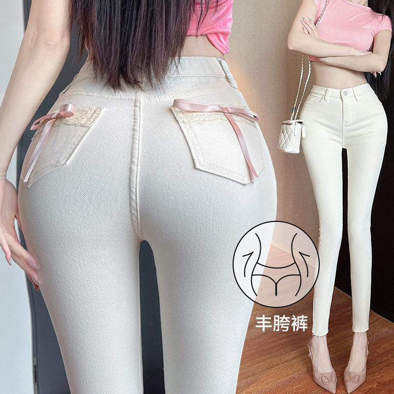 学院风后面丝带蝴蝶结白色牛仔裤女丰胯显瘦毛边紧身小脚裤子