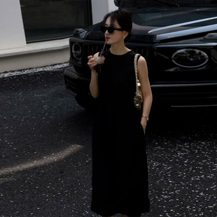 法式气质无袖棉麻连衣裙女2026夏季新款设计感后背镂空圆领背心裙