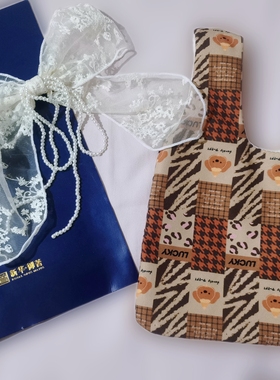 2025年新款热卖手腕包女手机包手臂包迷你小包咖色拼图防水印花包