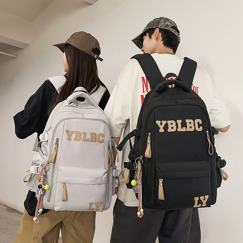 2026新品高中学生减负大容量书包男款护脊旅行初中女生大学生背包